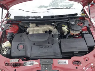 2003 Jaguar X-Type 2.5L Manual z VIN SAJEA51D63XC89273, wystawiony jako IAAI lot #41298544 z przebiegiem 124 400 mil mil oraz . Historia ofert i sprzedaży dostępna na DreamBid. Obrazek 10.