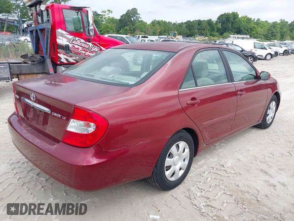 2002 Toyota Camry LE z VIN 4T1BE30K32U110304, wystawiony jako IAAI lot #42357455 z przebiegiem 221 389 mil mil oraz . Historia ofert i sprzedaży dostępna na DreamBid. Obrazek 4.