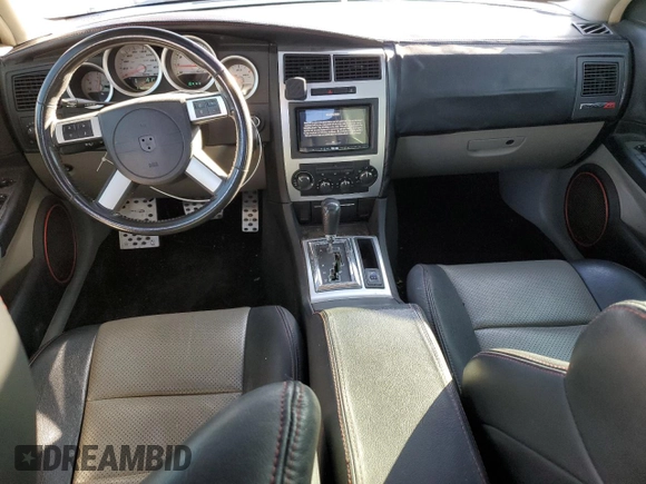2007 Dodge Charger SRT-8 with VIN 2B3KA73WX7H709265, listed as a Copart auction lot 78547114 with 82,130 mi miles and Salvage Title. Bid and sale history available at DreamBid. Image 8.