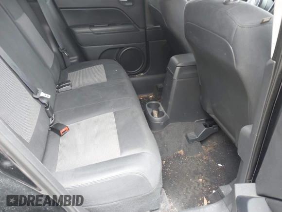 2014 Jeep Patriot Sport with VIN 1C4NJPBB7ED793811, listed as a IAAI auction lot 42442047 with 100,193 mi miles and . Bid and sale history available at DreamBid. Image 8.