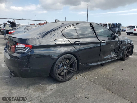 2015 BMW M5 with VIN WBSFV9C56FD594465, listed as a Copart auction lot 72085944 with 76,313 mi miles and Salvage Title. Bid and sale history available at carsss.com. Image 3.