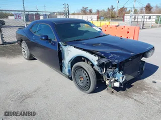 2013 Dodge Challenger R/T with VIN 2C3CDYBT7DH679522, listed as a IAAI auction lot 41387221 with 122,147 mi miles. Bid and sale history available at carsss.com. Image 1.