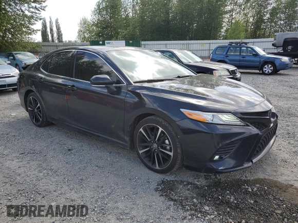 2020 Toyota Camry XSE with VIN 4T1K61AK2LU972205, listed as a Copart auction lot 55792685 with 106,696 mi miles and Salvage Title. Bid and sale history available at DreamBid. Image 4.