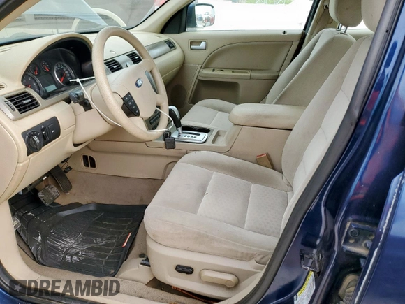 2005 Ford Five Hundred SE z VIN 1FAFP23135G175790, wystawiony jako Copart lot #56588085 z przebiegiem 117 354 mil mil oraz Szkody całkowita. Historia ofert i sprzedaży dostępna na DreamBid. Obrazek 7.