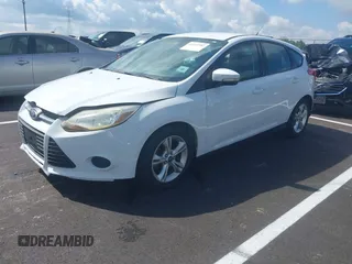 2014 Ford Focus SE z VIN 1FADP3K29EL387351, wystawiony jako IAAI lot #42167782 z przebiegiem 120 878 mil mil oraz . Historia ofert i sprzedaży dostępna na DreamBid. Obrazek 2.