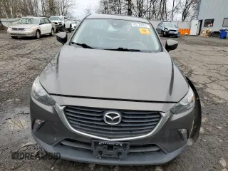 2018 Mazda CX-3 Sport z VIN JM1DKFB77J0312732, wystawiony jako Copart lot #45720065 z przebiegiem 99 866 mil mil oraz Szkoda całkowita • Salvage title. Historia ofert i sprzedaży dostępna na DreamBid. Obrazek 5.