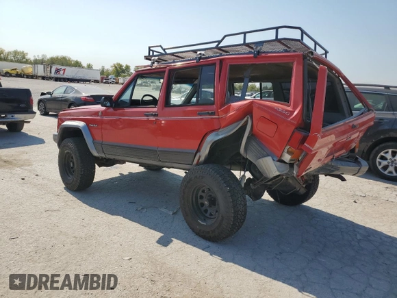 1996 Jeep Cherokee Country with VIN 1J4FJ78S9TL130605, listed as a Copart auction lot 74673934 with 196,857 mi miles and Salvage Title. Bid and sale history available at carsss.com. Image 2.