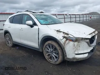 2019 Mazda CX-5 Grand Touring with VIN JM3KFBDM9K0697467, listed as a IAAI auction lot 41940364 with 62,015 mi miles. Bid and sale history available at carsss.com. Image 1.