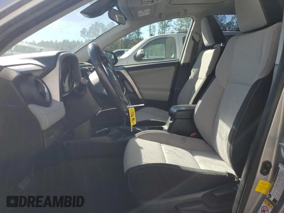 2018 Toyota RAV4 XLE with VIN JTMWFREV1JJ205906, listed as a Copart auction lot 84700564 with 64,953 mi miles and Salvage Title. Bid and sale history available at DreamBid. Image 7.