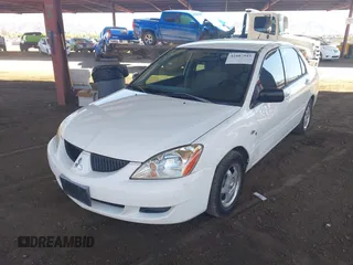 2004 Mitsubishi Lancer ES with VIN JA3AJ26E14U065498, listed as a IAAI auction lot 41887945 with 142,632 mi miles. Bid and sale history available at carsss.com. Image 2.