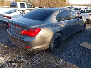 2011 BMW 7 Series 750i xDrive with VIN WBAKC6C58BC394310, listed as a IAAI auction lot 41226102 with 183,907 mi miles and . Bid and sale history available at DreamBid. Image 4.