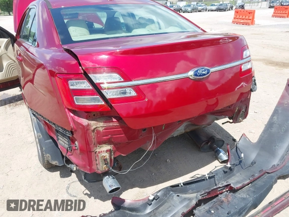 2014 Ford Taurus SEL z VIN 1FAHP2E89EG126922, wystawiony jako IAAI lot #42236235 z przebiegiem 176 917 mil mil oraz . Historia ofert i sprzedaży dostępna na DreamBid. Obrazek 6.