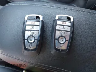2020 Ford Escape SEL z VIN 1FMCU0H6XLUB62303, wystawiony jako IAAI lot #42646790 z przebiegiem 70 895 mil mil oraz . Historia ofert i sprzedaży dostępna na DreamBid. Obrazek 11.