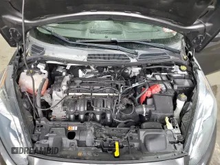 2019 Ford Fiesta SE z VIN 3FADP4BJ5KM124183, wystawiony jako Copart lot #53210525 z przebiegiem 77 120 mil mil oraz Szkoda całkowita • Salvage title. Historia ofert i sprzedaży dostępna na DreamBid. Obrazek 12.