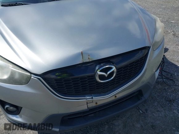 2013 Mazda CX-5 Touring with VIN JM3KE4CE5D0125470, listed as a IAAI auction lot 42051475 with 277,077 mi miles. Bid and sale history available at carsss.com. Image 6.