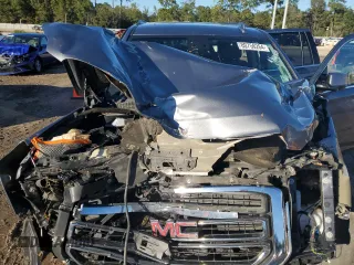 2019 GMC Yukon SLT with VIN 1GKS1BKC6KR217015, listed as a Copart auction lot 80756264 with 110,186 mi miles and Salvage Title. Bid and sale history available at carsss.com. Image 14.