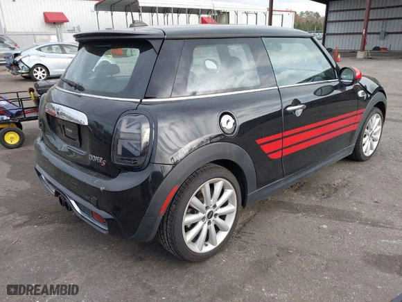 2014 MINI Cooper Hardtop S with VIN WMWXM7C50ET986183, listed as a IAAI auction lot 41719571 with NaN miles. Bid and sale history available at carsss.com. Image 4.