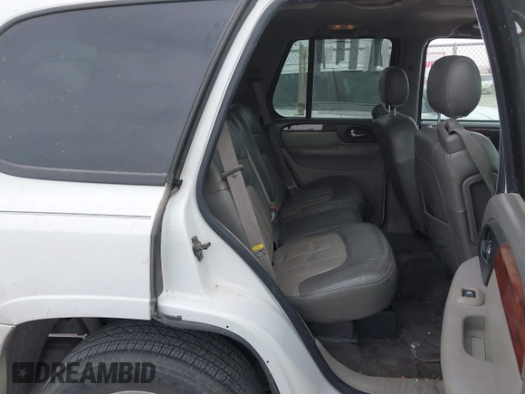 2003 GMC Envoy SLE with VIN 1GKDS13S532253648, listed as a IAAI auction lot 41850094 with 147,254 mi miles. Bid and sale history available at carsss.com. Image 8.