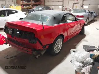 2014 Ford Mustang V6 with VIN 1ZVBP8EM9E5303736, listed as a IAAI auction lot 41895487 with 130,149 mi miles. Bid and sale history available at carsss.com. Image 4.