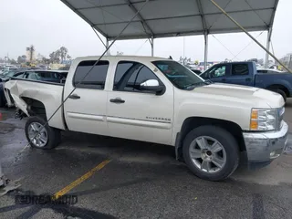 2013 Chevrolet Silverado 1500 LT with VIN 3GCPCSE06DG187949, listed as a IAAI auction lot 41799296 with 169,919 mi miles and . Bid and sale history available at DreamBid. Image 13.