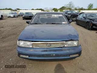 1993 Nissan Maxima z VIN JN1HJ01F8PT075754, wystawiony jako Copart lot #61406264 z przebiegiem 69 379 mil mil oraz Nie do naprawy. Historia ofert i sprzedaży dostępna na DreamBid. Obrazek 5.