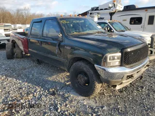 2003 Ford F-350 XL with VIN 1FTWW33F63EA29777, listed as a Copart auction lot 81047684 with 214,722 mi miles and Salvage Title. Bid and sale history available at DreamBid. Image 4.