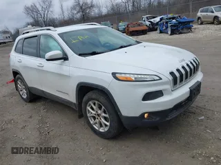 2015 Jeep Cherokee North with VIN 1C4PJMCS6FW564435, listed as a IAAI auction lot 41992440 with 166,048 mi miles. Bid and sale history available at carsss.com. Image 1.