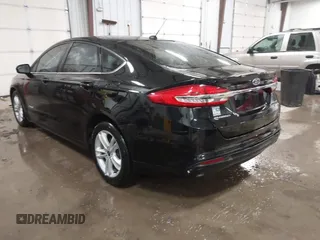 2018 Ford Fusion SE z VIN 3FA6P0LU3JR203864, wystawiony jako IAAI lot #41476335 z przebiegiem 49 246 mil mil oraz . Historia ofert i sprzedaży dostępna na DreamBid. Obrazek 3.