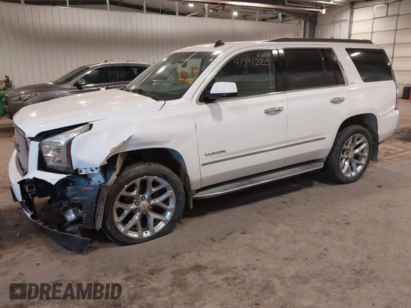 2015 GMC Yukon SLE with VIN 1GKS2AKC6FR103447, listed as a IAAI auction lot 41596220 with 104,209 mi miles. Bid and sale history available at carsss.com. Image 21.
