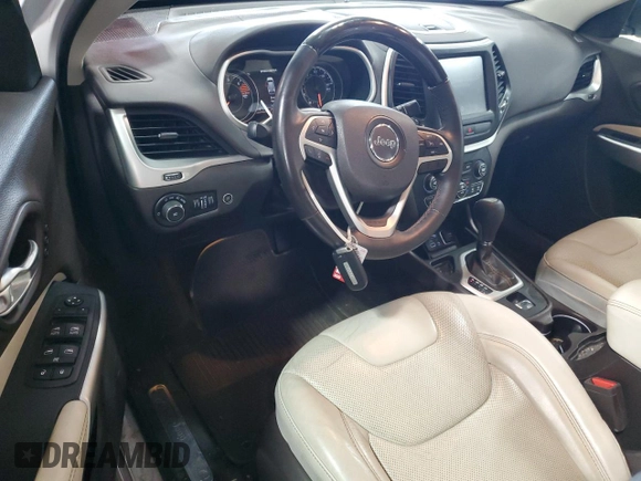 2016 Jeep Cherokee Overland with VIN 1C4PJLJB0GW302604, listed as a Copart auction lot 70624834 with 96,394 mi miles and Salvage title. Bid and sale history available at DreamBid. Image 8.