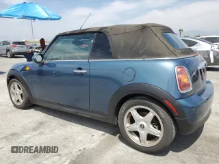 2009 MINI Convertible with VIN WMWMR33589TU96481, listed as a Copart auction lot 52785515 with 144,792 mi miles and Clean Title. Bid and sale history available at DreamBid. Image 2.