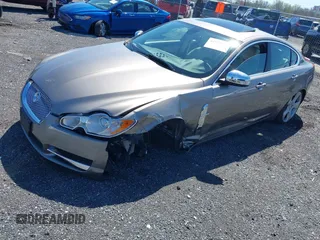 2009 Jaguar XF with VIN SAJWA07CX91R01263, listed as a IAAI auction lot 41994525 with 141,729 mi miles and . Bid and sale history available at DreamBid. Image 2.