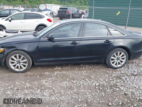 2014 Audi A6 Premium Plus z VIN WAUGFAFCXEN065126, wystawiony jako IAAI lot #42333403 z przebiegiem 121 467 mil mil oraz . Historia ofert i sprzedaży dostępna na DreamBid. Obrazek 14.