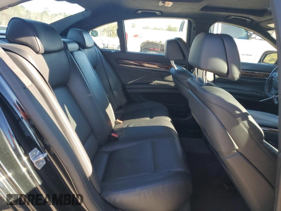 2015 BMW 7 Series 750i xDrive with VIN WBAYB6C57FD965993, listed as a Copart auction lot 83871924 with 76,720 mi miles and Salvage Title. Bid and sale history available at carsss.com. Image 10.