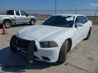 2012 Dodge Charger Police with VIN 2C3CDXAT6CH305817, listed as a IAAI auction lot 41608673 with 173,761 mi miles. Bid and sale history available at carsss.com. Image 6.