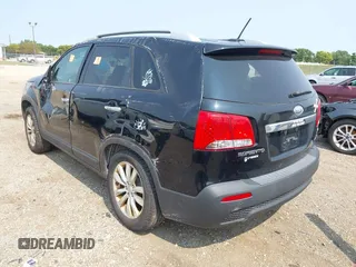 2011 Kia Sorento EX with VIN 5XYKU3A11BG176980, listed as a IAAI auction lot 40322036 with 234,448 mi miles. Bid and sale history available at carsss.com. Image 3.