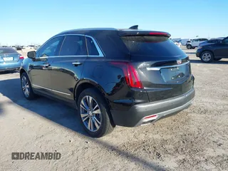 2024 Cadillac XT5 FWD Premium Luxury with VIN 1GYKNCRS4RZ729461, listed as a IAAI auction lot 41411300 with 5,760 mi miles. Bid and sale history available at carsss.com. Image 3.