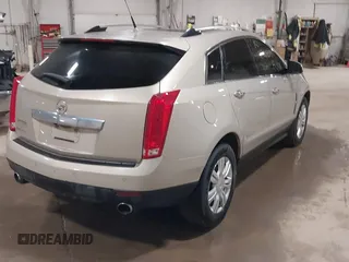 2011 Cadillac SRX Luxury Collection with VIN 3GYFNDEY3BS660007, listed as a IAAI auction lot 41780839 with 203,651 mi miles. Bid and sale history available at carsss.com. Image 4.