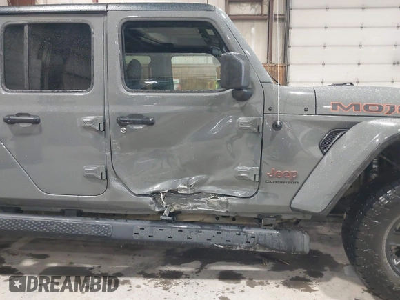 2021 Jeep Gladiator Mojave z VIN 1C6JJTEG5ML524829, wystawiony jako IAAI lot #42247982 z przebiegiem 20 158 mil mil oraz . Historia ofert i sprzedaży dostępna na DreamBid. Obrazek 6.
