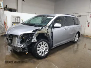 2012 Toyota Sienna XLE z VIN 5TDDK3DC5CS033868, wystawiony jako Copart lot #74727814 z przebiegiem 98 798 mil mil oraz Szkoda całkowita • Salvage title. Historia ofert i sprzedaży dostępna na DreamBid. Obrazek 1.