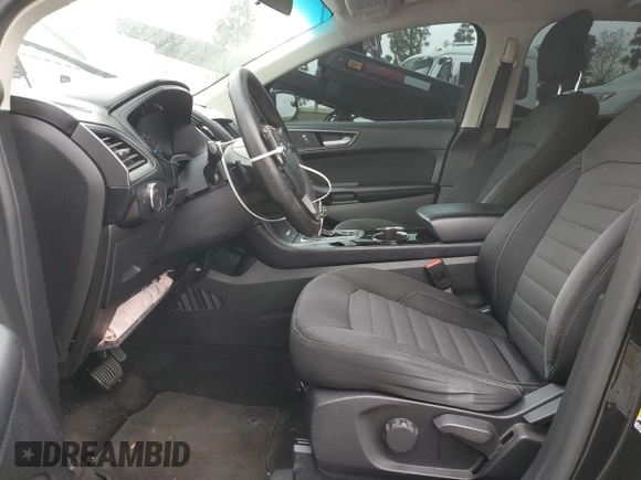 2015 Ford Edge SE with VIN 2FMTK4G91FBB43125, listed as a Copart auction lot 49981935 with 148,678 mi miles and Salvage title. Bid and sale history available at DreamBid. Image 7.