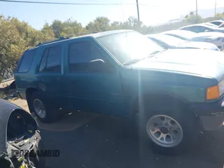 1995 Isuzu Rodeo LS z VIN 4S2CY58V6S4316697, wystawiony jako IAAI lot #42103936 z przebiegiem 143 185 mil mil oraz . Historia ofert i sprzedaży dostępna na DreamBid. Obrazek 12.