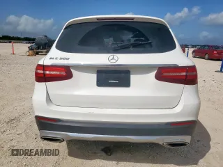 2018 Mercedes-Benz GLC 300 with VIN WDC0G4JB3JV025492, listed as a Copart auction lot 61674235 with 99,671 mi miles and Salvage title. Bid and sale history available at DreamBid. Image 6.