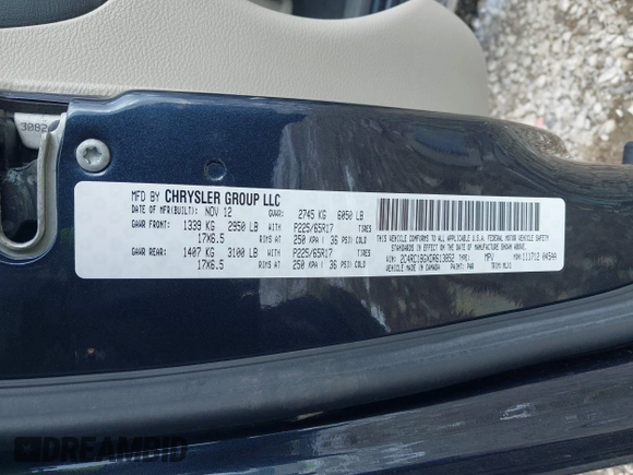 2013 Chrysler Town & Country Touring with VIN 2C4RC1BGXDR613852, listed as a IAAI auction lot 40973841 with 150,234 mi miles. Bid and sale history available at carsss.com. Image 9.