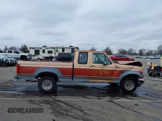 1994 Ford F-150 with VIN 1FTEX15NXRKB25889, listed as a IAAI auction lot 41031876 with 201,211 mi miles. Bid and sale history available at carsss.com. Image 14.