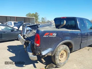 2003 Ford F-150 XL with VIN 1FTRX18L73NB36799, listed as a IAAI auction lot 41317602 with 270,075 mi miles. Bid and sale history available at carsss.com. Image 14.