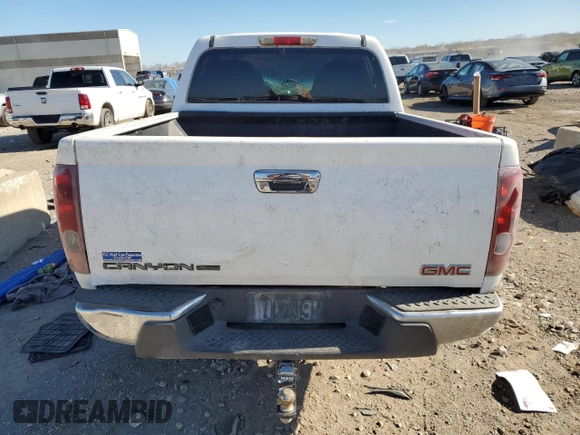 2009 GMC Canyon SLE1 with VIN 1GTDT13E798153544, listed as a Copart auction lot 79708234 with 0 mi miles and Salvage Title. Bid and sale history available at carsss.com. Image 6.