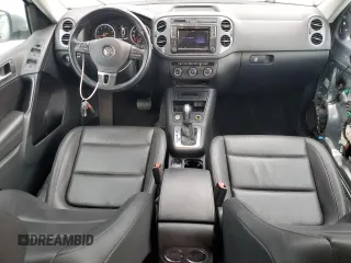 2017 Volkswagen Tiguan S with VIN WVGAV7AX9HK002092, listed as a Copart auction lot 52210695 with 113,791 mi miles and Salvage Title. Bid and sale history available at DreamBid. Image 8.