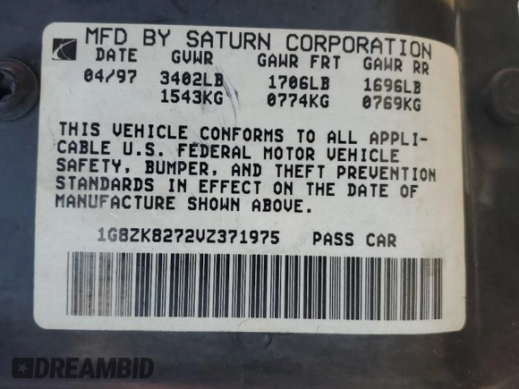 1997 Saturn SW z VIN 1G8ZK8272VZ371975, wystawiony jako Copart lot #75880424 z przebiegiem 121 194 mil mil oraz Szkody całkowita. Historia ofert i sprzedaży dostępna na DreamBid. Obrazek 12.