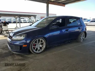 2012 Volkswagen GTI w/Sunroof & Navi z VIN WVWGV7AJ7CW039573, wystawiony jako Copart lot #52460365 z przebiegiem 104 775 mil mil oraz Szkoda całkowita • Salvage title. Historia ofert i sprzedaży dostępna na DreamBid. Obrazek 1.